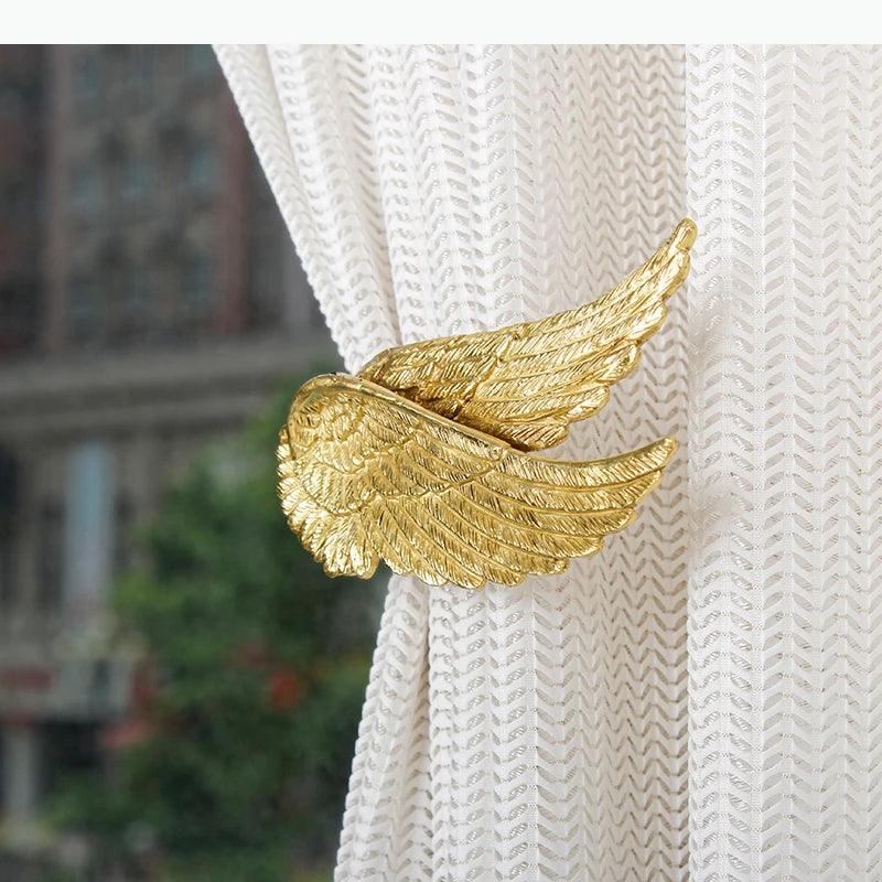 boucles rideau or ailes sculptées classiques décoratives noels dorés deux pièces