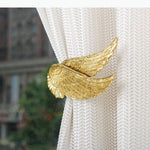 boucles rideau or ailes sculptées classiques décoratives noels dorés deux pièces