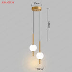 suspension lumineuse moderne sphères translucides blanc doré chambre salon minimaliste
