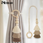 rideau boho chic anneaux bois pompons coton beige clair uni