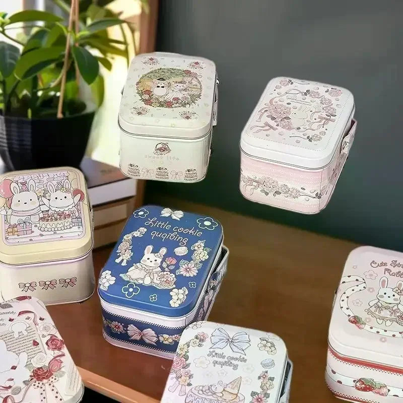 boîtes métalliques blanc rose bleu beige lapins fleurs rubans noël cartoon mignon illustrations