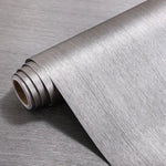Détail de la texture brossée du papier peint auto-adhésif en couleur Beige clair
