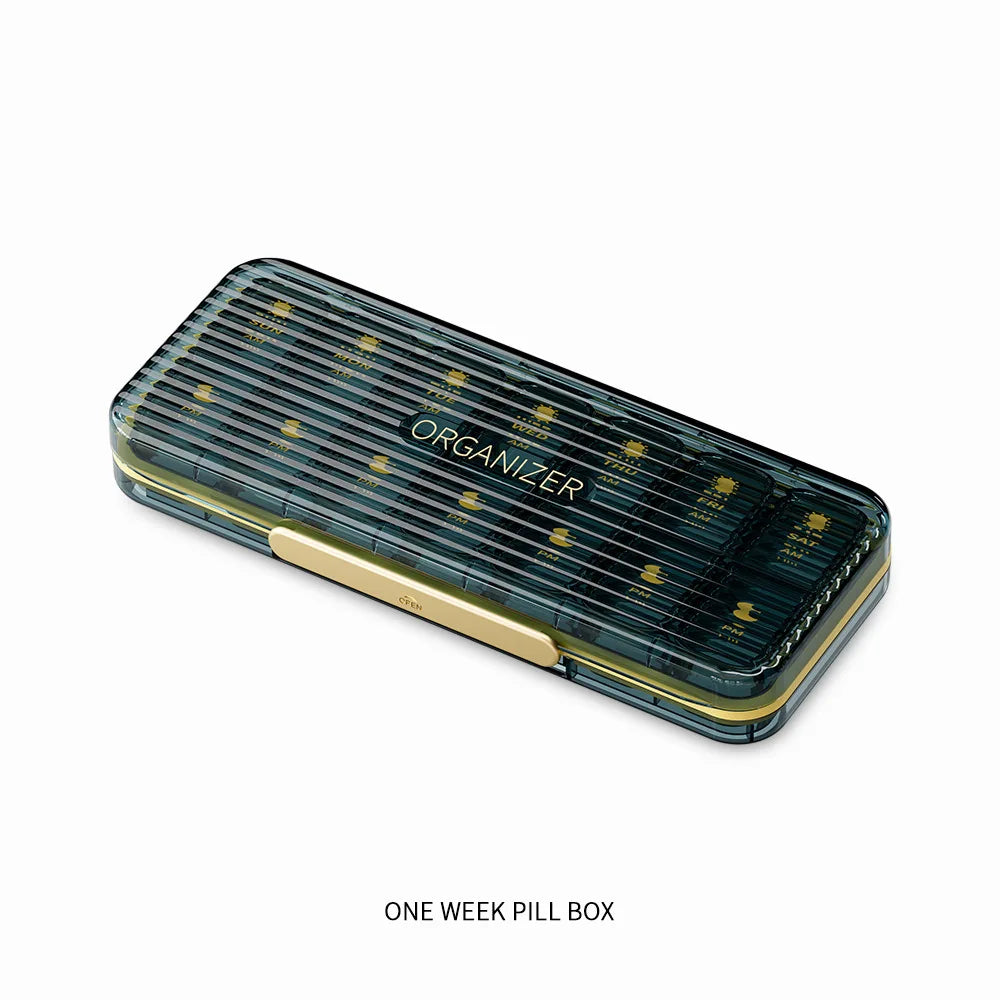 boîte rangement pilules voyage étanche noir vert bleu 14 compartiments moderne pratique