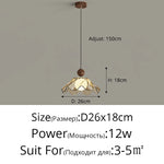 lampe suspendue moderne doré beige translucide texture ondulée motif floral câble noir réglable chambre