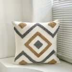 coussin brodé polyester moderne bohème motif géométrique blanc beige bleu gris marron 45x45cm