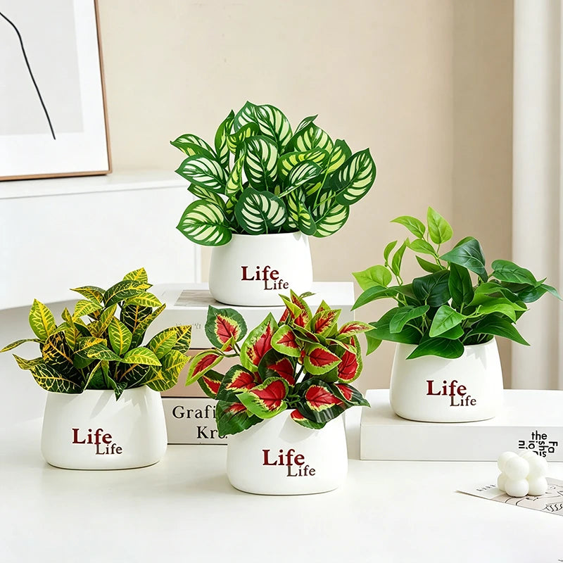 plantes artificielles vertes moderne pots blancs décoration intérieure feuilles variées minimaliste