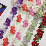 ruban décoratif brodé fleurs violet orange rose vert gris rouge 4cm large polyesterOpaque