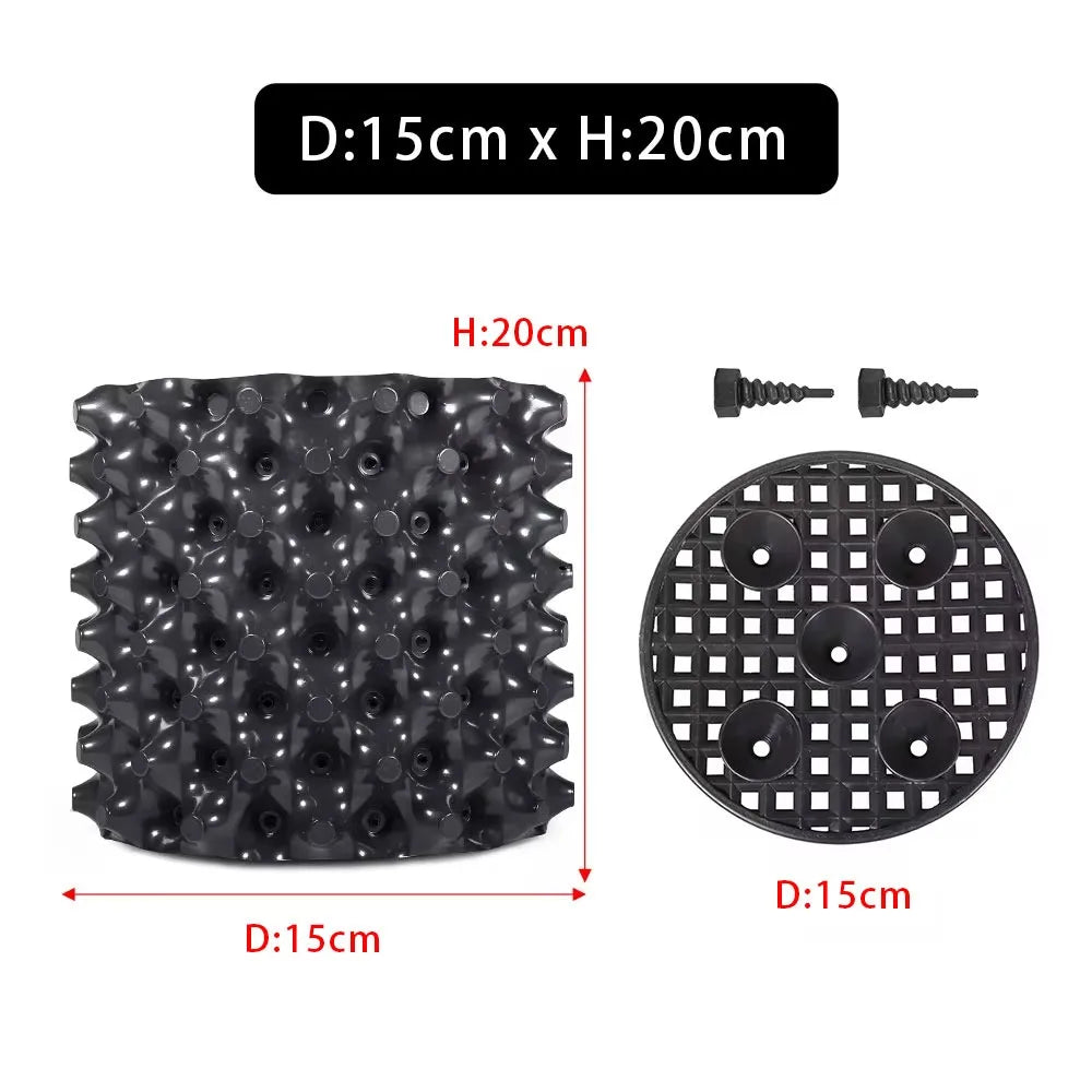 grille drainage plante noir moderne perforations circulaires différentes tailles incluses