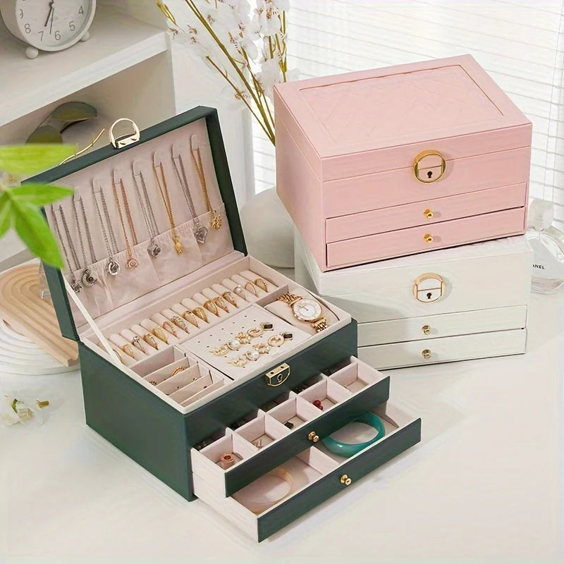 boîte rangement bijoux cuir blanc moderne élégante poignées métalliques verrouillable intérieure motifs géométriques