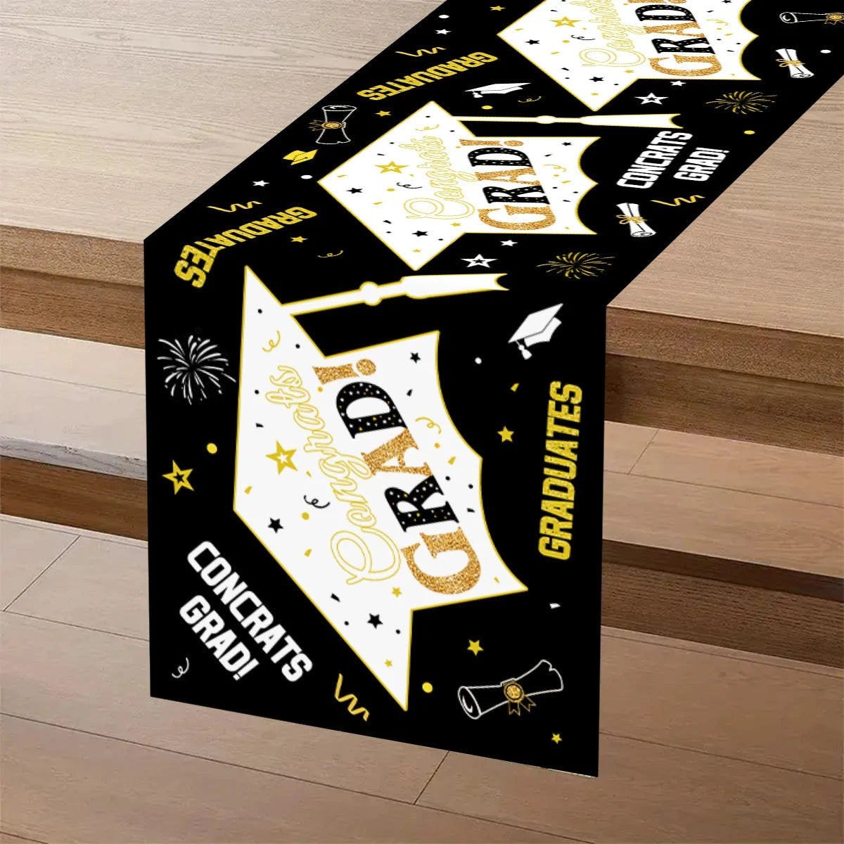 nappe table fête remise diplôme motifs cérémonie confettis étoiles feu artificiel polyester noire or