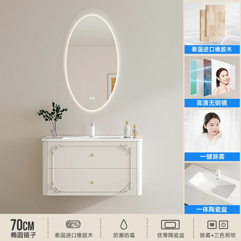 meuble salle bain noir blanc tiroirs vasque ornements dorés classique fixations murales accessoires cosmétiques
