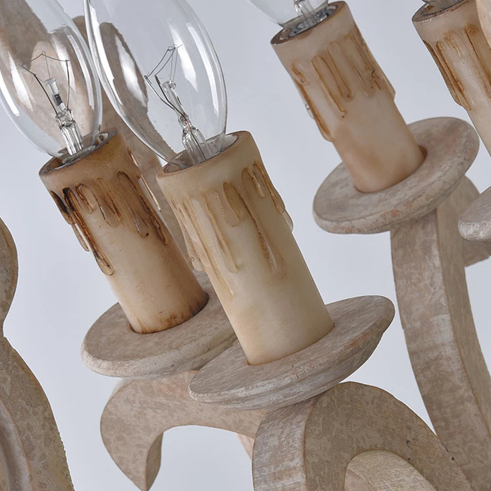 suspension lumineuse bois ornements sculptés finition rustique classique vintage blanc beige salle manger restaurant