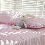 protège matelas bleu clair quilté moderne oreiller tasse jouet lapin