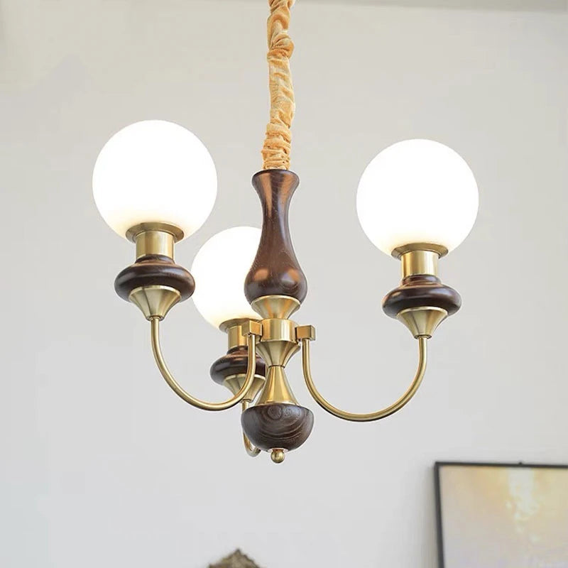 lustre classique doré noir sphères translucides structure métallique led salon chambrehôtel