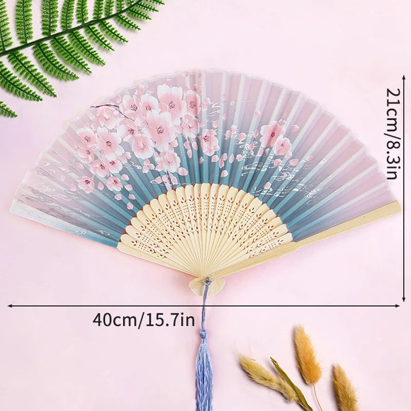 éventail pliant traditionnel bambou motif fleurs cerisier pompon mariage élégant