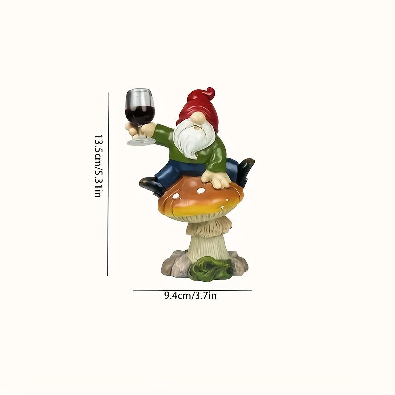 statue gnome assis champignon rouge vêtement vert pantalon bleu barbe blanche verre vin opaque