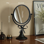 miroir table rotatif or noir rose poudré élégant vintage rubans crèmes aromathérapie