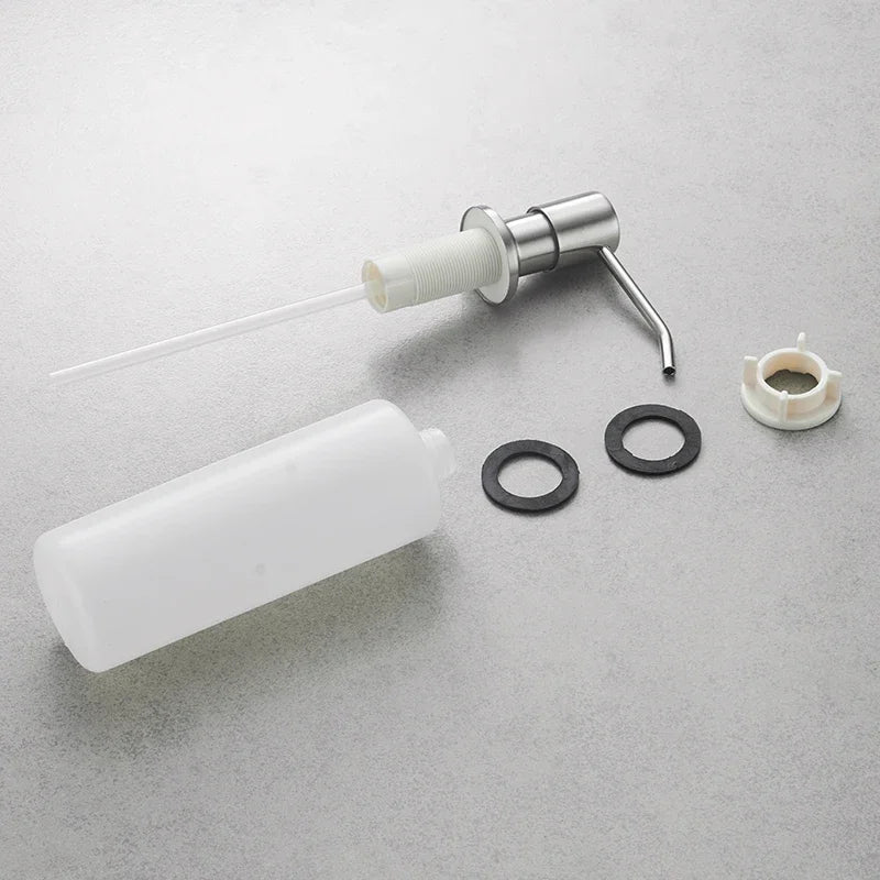 distributeur savon liquide acier inoxydable finition brossée blanc noir texture granulée moderne minimaliste fixation