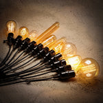 ampoules filament vintage transparentes dorées éclairage rétro tringles câbles noirs e27 180deg 30000h
