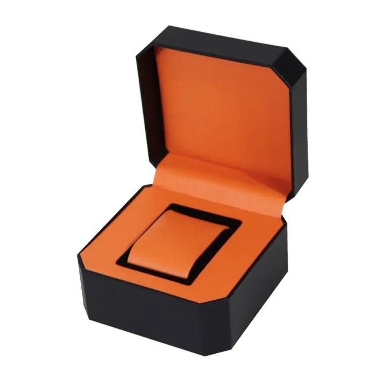 montre vintage cuir noir fond orange boite rangement elegante exposition