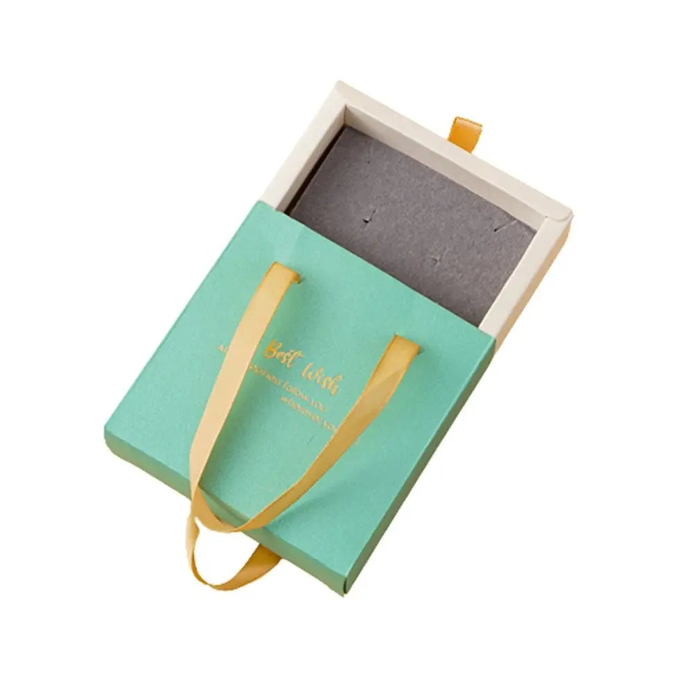 boîte cadeau classique violet ruban doré blanc vert noir papier mat anti poussière emballage