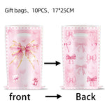 vaisselle jetable rose anniversaire filles assiettes gobelets serviettes nappe motif ruban fête enfant