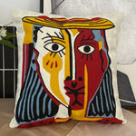 housse coussin coton brodé motifs abstraits visages stylisés moderne pop art bleu blanc orange