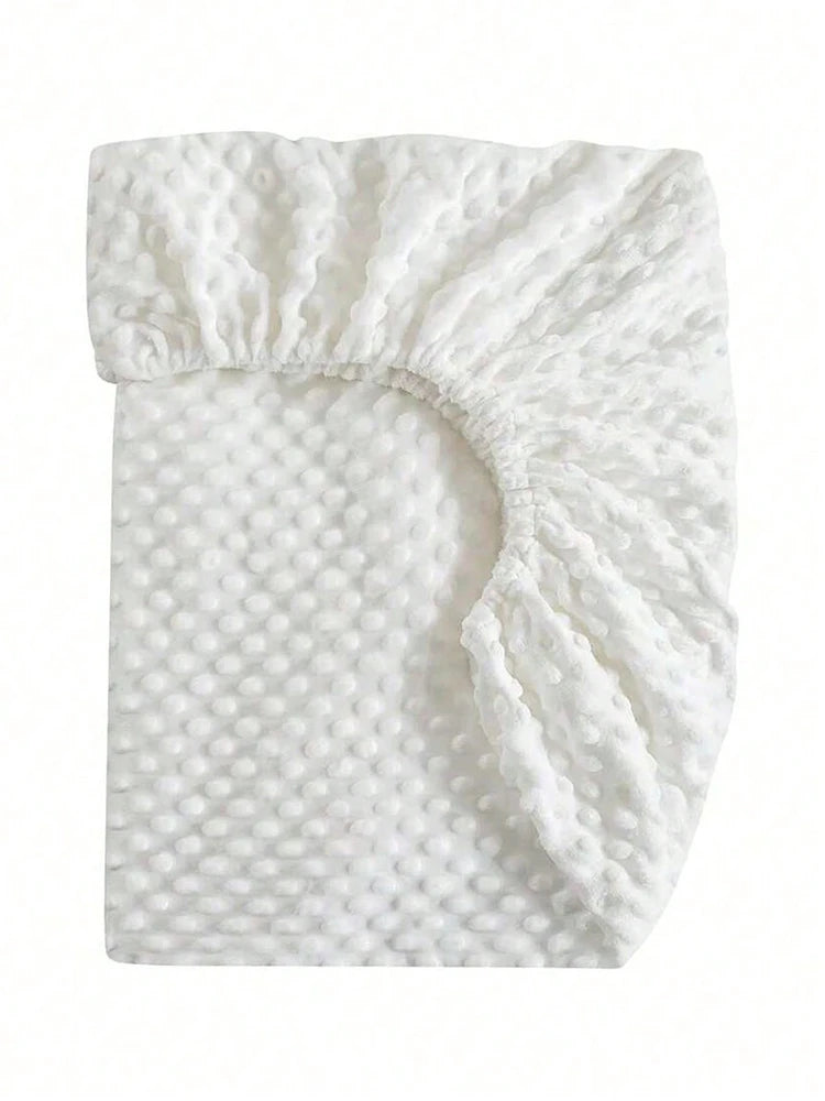 drap housse lit bébé gris blanc moderne perforations points élastiques doux