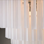 Suspension lumineuse moderne blanc translucide rangées verticales tubes chaîne métallique sources lumineuses 10 15m²