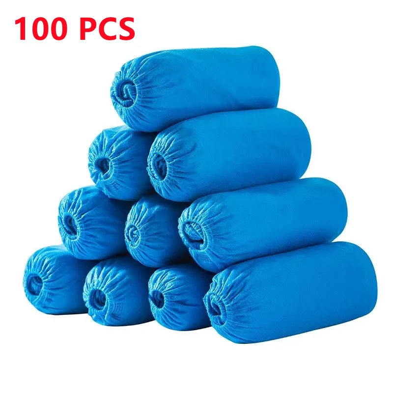 protège chaussures jetables non tissés bleu clair élastiques 100 pièces