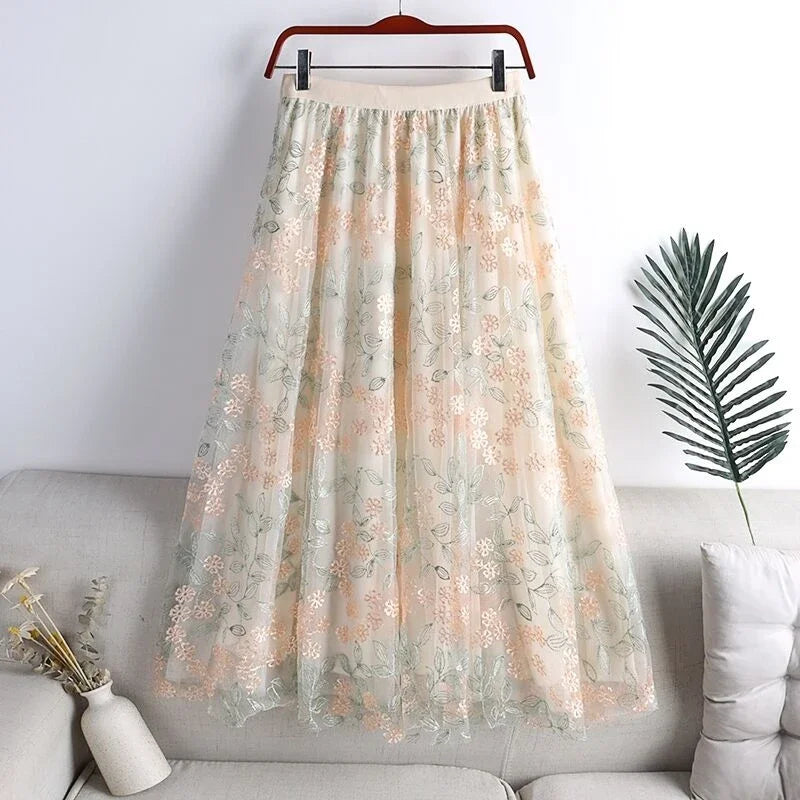 jupe vert clair broderie florale élégante romantique translucide décontractée femme mi mollet