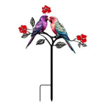 sculpture jardin moderne motifs fleurs insectes stylisés rouge noir vert blancextérieur decoration amusante fait
