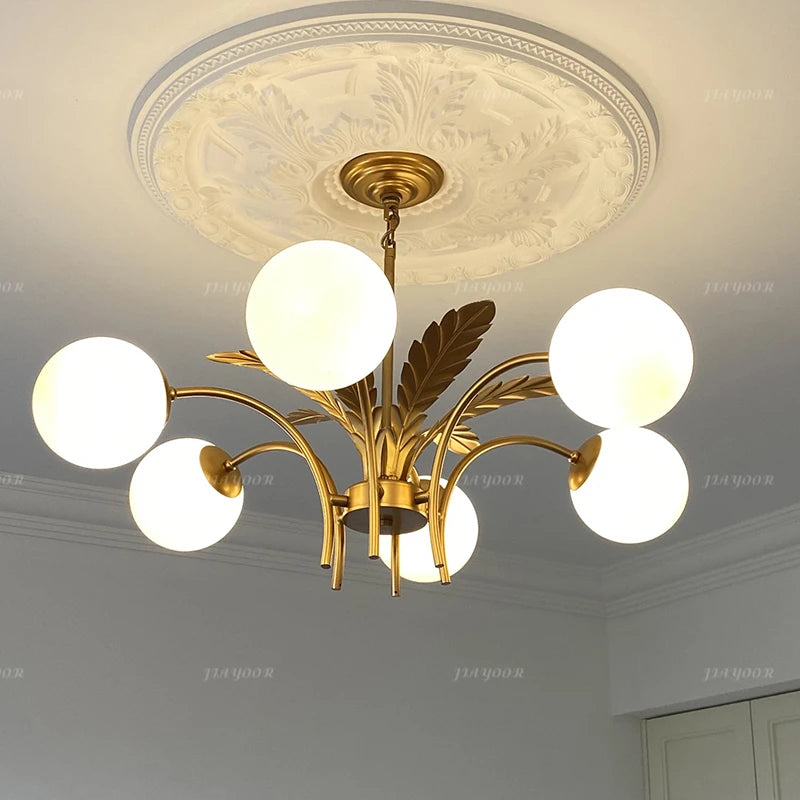 lustre élégant or feuilles stylisées 68cm diamètre 32cm hauteur ampoules e14