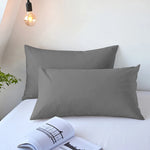 taies d'oreiller lisses polyester coton gris bleu rose blanc modernes literie décoration chambre voyage
