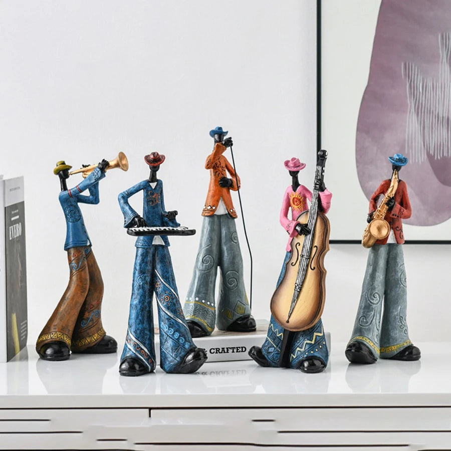 statues musiciens saxophone trompette ethniques motifs floraux bleu marron orange gris