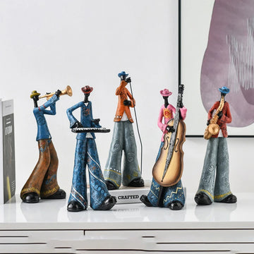 statues musiciens saxophone trompette ethniques motifs floraux bleu marron orange gris