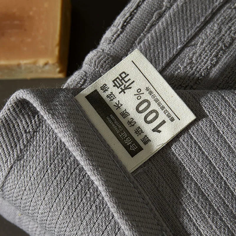 serviette coton absorbante lavable machine motif géométrique gris classique douce utilisation quotidienne
