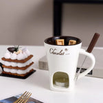fondue chocolat moderne tasses lait rouge noir blanc cuillère bougie