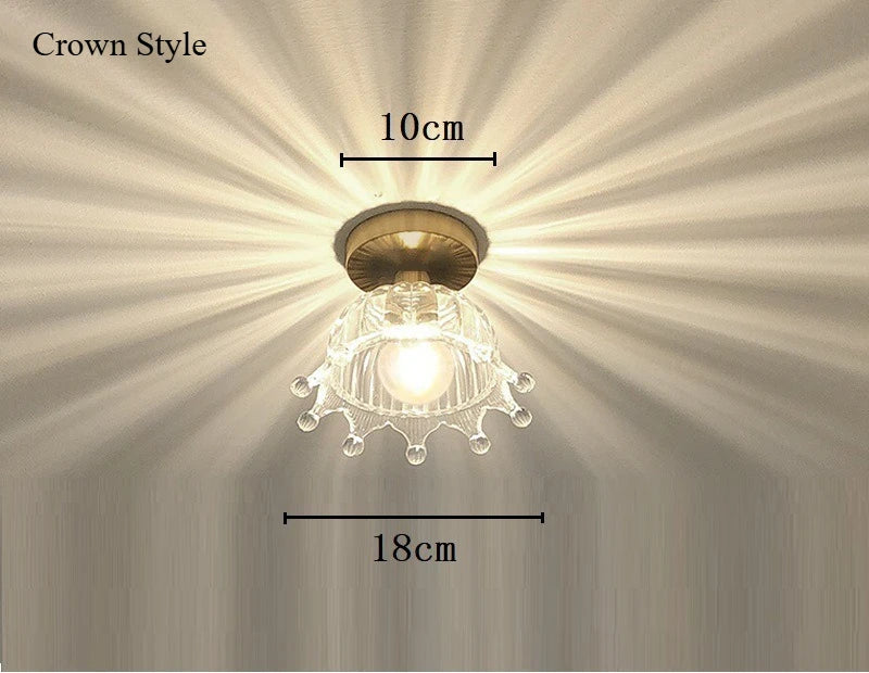 lampe suspendue or transparente motif floral texture ondulée moderne élégante tringle câble