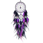 attrape rêves traditionnels plumes cercles concentriques rouge noir bleu vert orange violet rose