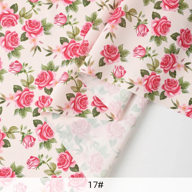 tissu mousseline polyester imprimé fleurs roses fond noir couture robe chemisier rideau diy