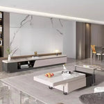 table basse moderne marbre blanc gris pieds noirs fruits magazine vase