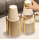 porte verres moderne élégants dorés transparents contenant verres carton beige