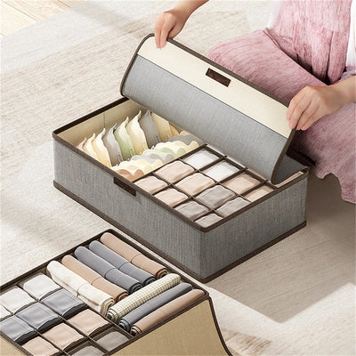 Boîte de rangement pour vêtements gris clair avec couvercle anti-poussière