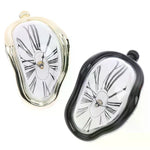 horloges murales surréalistes dali or noir argent chiffres romains aiguilles forme organique transparentes salon