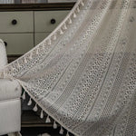 rideau crocheté boho chic motifs géométriques pompons blancs translucide polyester beige clair salon 150x100cm