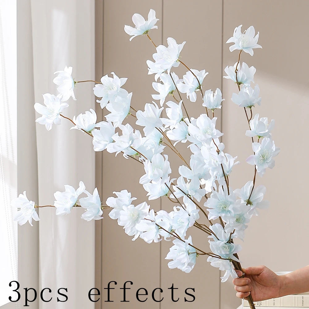 décoration intérieure bouquet fleurs artificielles rose naturel blanc orange rouge bleu vase minimaliste
