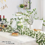 guirlande fleurs artificielles roses blanches feuilles vertes décoration extérieure mariage romantique