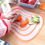 planche découper transparente anti dérapante blanc orange moderne rayures concentriques