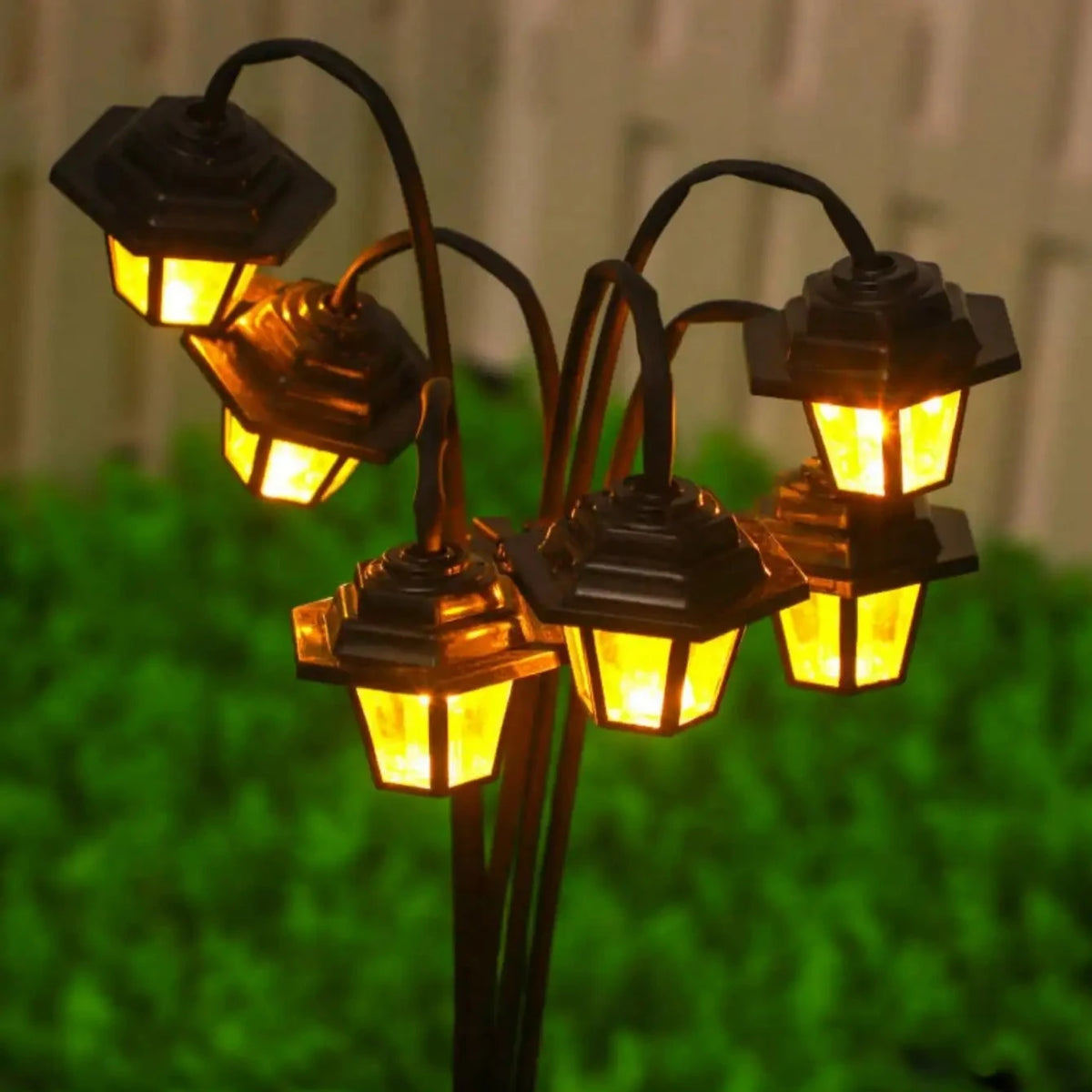 lanternes solaires vintage hexagonales LED noires lumière orangée jardin extérieur